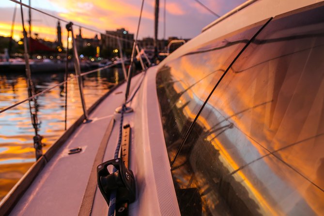 Barcelona Unique Sunset Sailing Experience with Tapas & Open Bar - Live Music Upgrade: Sax and Guitar Energy Without the Hassle