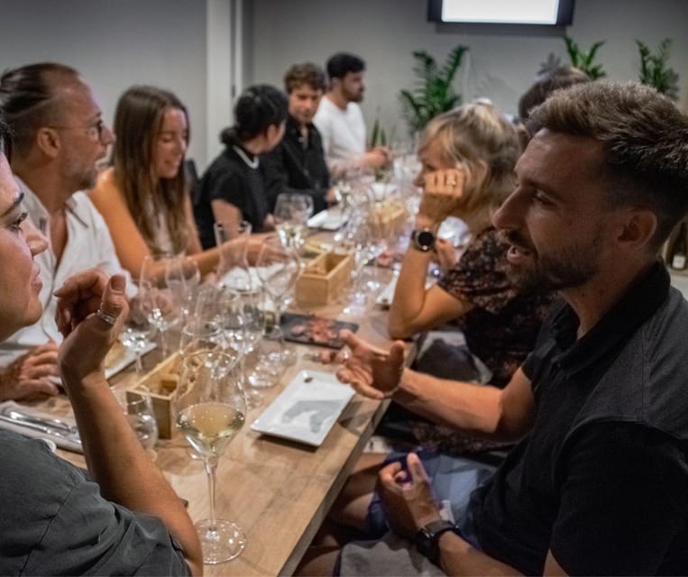 Barcelona: Wine Tasting and Tapas 5-Course Pairing Dinner - Vivinos Wine Bar Meeting Point and the Room Atmosphere