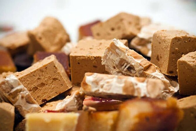 Best of Barcelona: Sagrada Família, Gaudí & Candy Tasting Tour! - Passeig de Gràcia: La Pedrera and the First Candy Stop