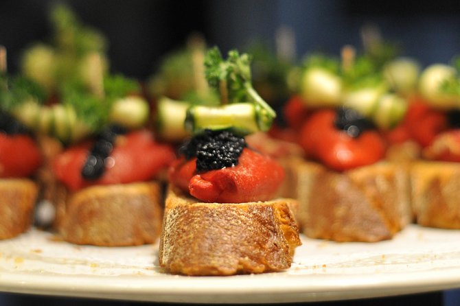 Born to Eat: Gourmet Tapas & Wine Small Group Tour in Old Barcelona - The real show: tapas stops and snacks that build toward Cava
