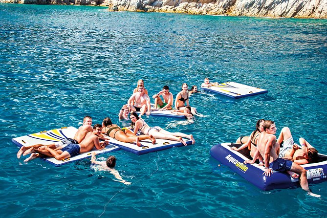 Catamaran ride -Costa Brava with barbecue and drinks. Familiar. - Why This Catamaran Trip Works on the Costa Brava