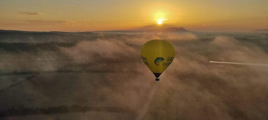 Costa Brava: Hot Air Balloon Flight - Shared - After the landing: cava toast, almond cake, and the GPS keepsakes