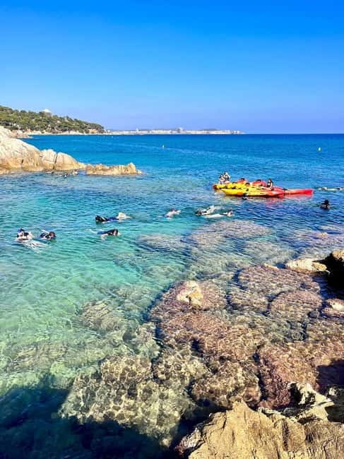 From Barcelona: Costa Brava Kayak & Snorkel Tour with Picnic - Rock caves and volcanic cliffs: why this day trip feels different