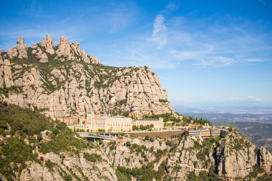 From Barcelona: Half-Day Montserrat Small Group Guided Tour - Meet-up and coach comfort at Estació de França