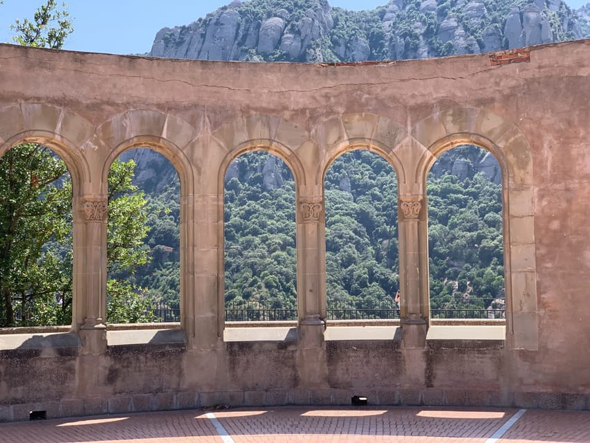 From Barcelona: Half-Day Trip to Montserrat Mountain - The Montserrat Monastery Tour: A Medieval Setting With a Real Guide