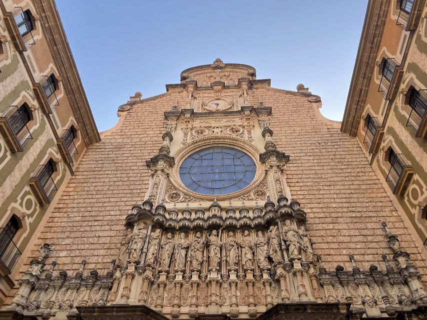 From Barcelona: Private Montserrat and Boutique Winery Tour - Inside the Montserrat monastery: Black Madonna, basilica, and Santa Cova