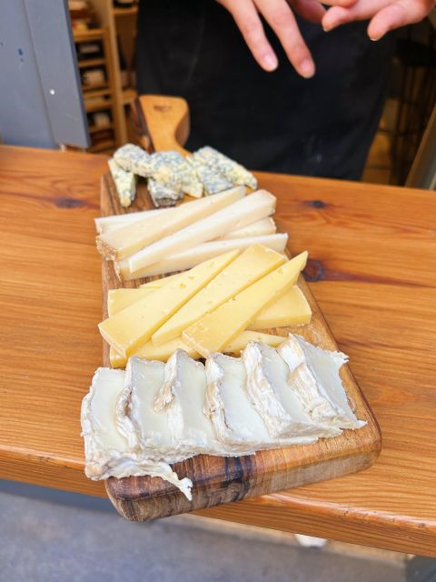 Girona Evening Food Tour & Tapas Bar Experience - Plaça de Catalunya + Casa Cacao: regional bites and a sweet detour