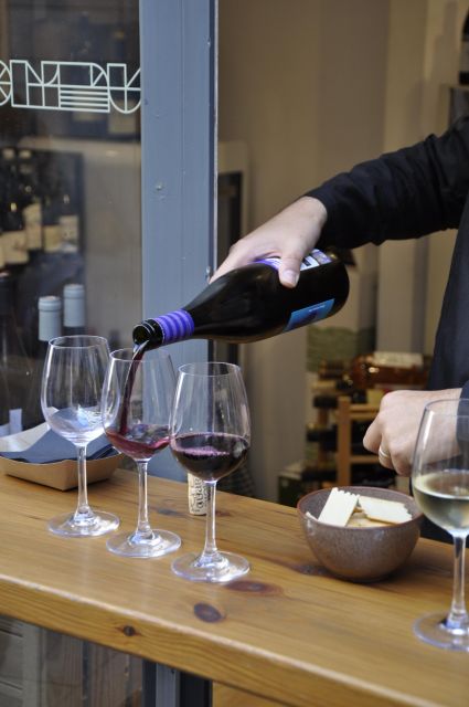 Girona Evening Food Tour & Tapas Bar Experience - Carrer de les Olles finale: tapas, wine, and dessert
