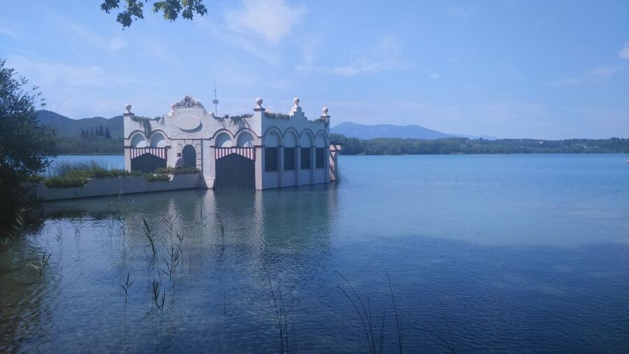 Girona: Volcano Area, Besalú, and Banyoles Lake Tour - Santa Pau: castle views, church charm, and village life