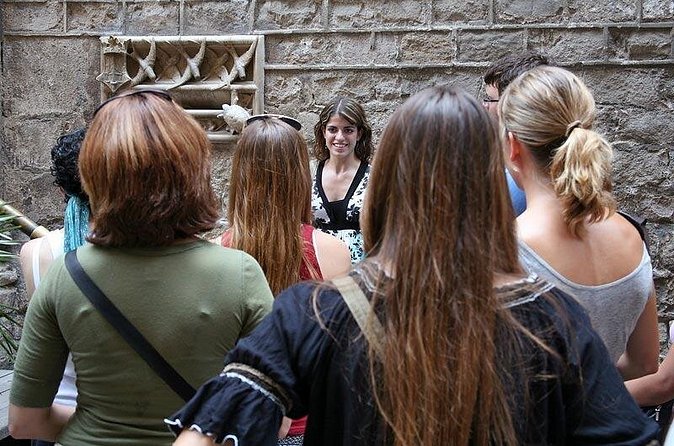 Gothic Quarter Donation-Based Walking Tour in English - Plaça Sant Felip Neri: war scars in the stone, then quiet