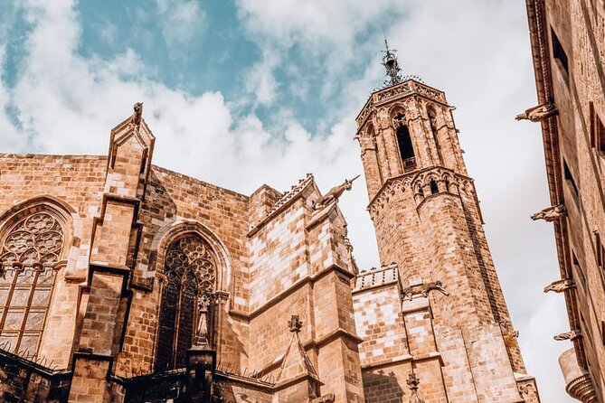 Introduction to Barcelona's Old Town Gothic Quarter Walking Tour - Pont del Bisbe’s charm has a dark joke under the stone