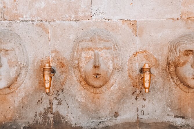 Introduction to Barcelona's Old Town Gothic Quarter Walking Tour - Plaça de Sant Jaume: the square that still runs the show