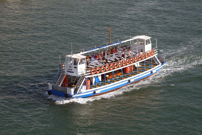 Las Golondrinas Barcelona 40-min Boat Tour - The onboard experience: mobile app guidance, plus staff Q&A