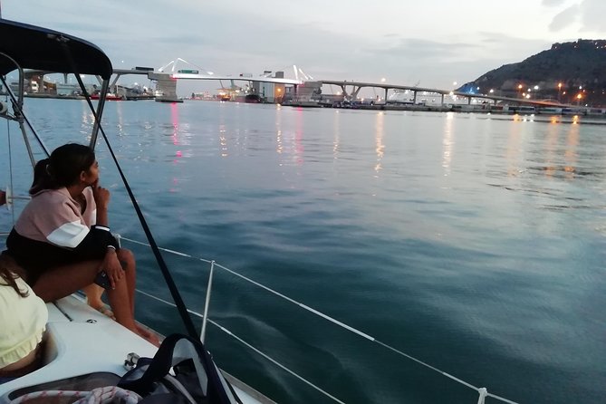 Luxury Private Sunset Cruise in Barcelona – Open Bar Included - The white drawbridge and Maremagnum pontoons: a modern waterfront contrast