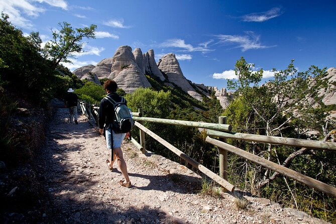 Montserrat Complete Guided Tour & The Boys Choir's Performance - Stop 3: Abadia de Montserrat and What Makes It Different
