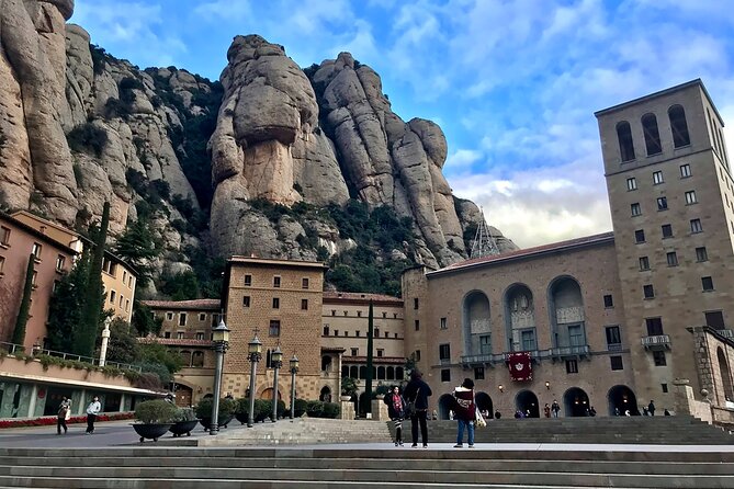 Montserrat Day Trip from Barcelona with Cogwheel Train - Santa Maria de Montserrat Abbey and La Moreneta up close