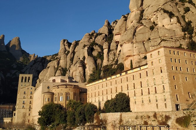 Montserrat Hiking Experience & Monastery Premium Small Group Tour - Riding Up to Montserrat: The Scenic Van Start at Passeig de Gràcia
