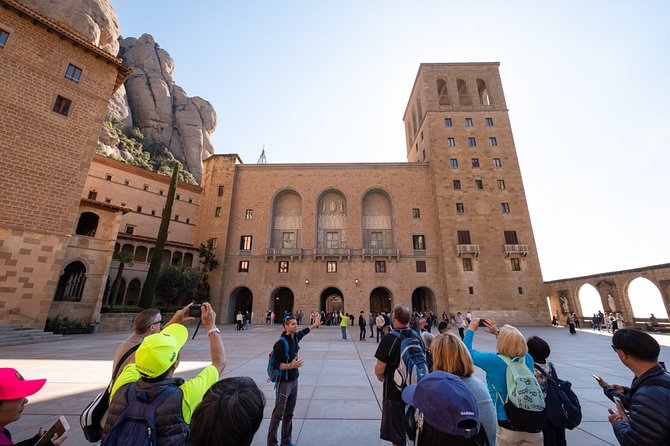 Montserrat Monastery with Easy Hike & Sitges Tour from Barcelona - Abadia de Montserrat: Basilica, Atrium, and the Feeling of a Sacred Place