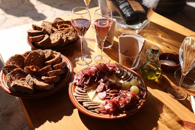 Montserrat Private Day Trip with Codorniu Cava Cellar Tasting - Mercat de Montserrat: food tasting with local production stories