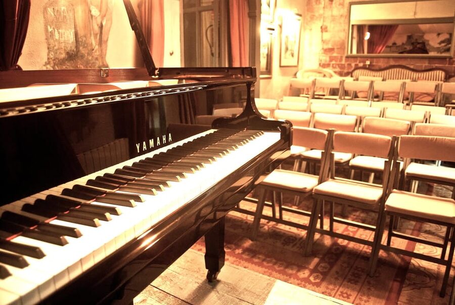 Only Chopín: Exquisite Piano evenings in Barcelona - The candlelit garden finale with torches and cava