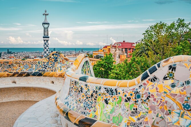 Park Guell Guided Group Tour with Optional Sagrada Familia - Casa del Guarda and the mosaic roof moment