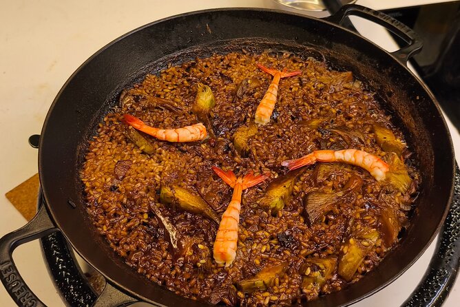 Premium Cooking Class in Designer Loft: Paella & Spanish Tapas - La Foodieteca welcome: cava, Iberian bites, and cathedral views