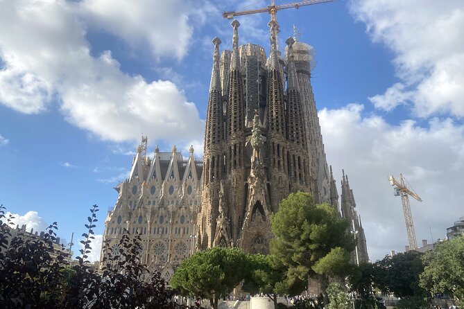 Private discovery bike tour of Barcelona - Walking past the Gothic Cathedral and modernist concert culture