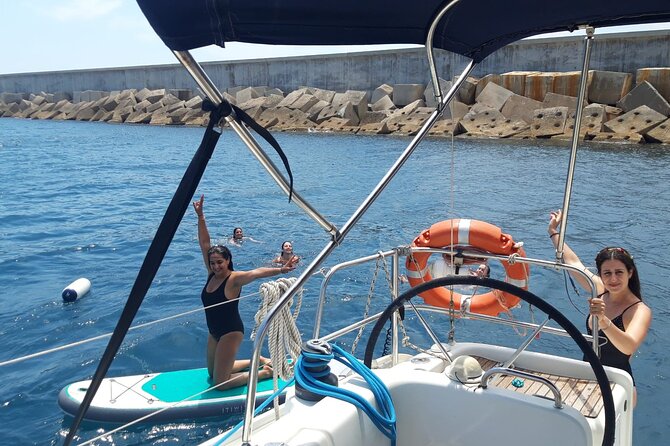 Private sailing and paddlesurfing tour with skipper up to 11 people - Barcelona Skyline from Sea Level: Sagrada Família, Montjuïc, Agbar Tower