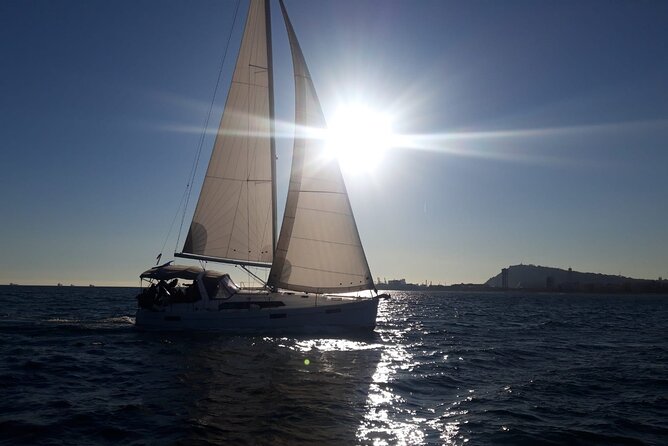 Private sailing and paddlesurfing tour with skipper up to 11 people - Bogatell Beach: A Relaxed Coastline View with Architecture in Frame