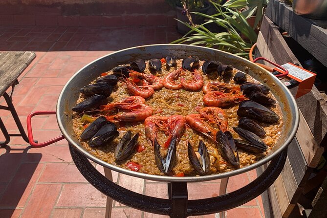 Rooftop Paella Seafood Cooking Class Experience in Barcelona - The terraza dinner moment: Sunset, plants, and why timing feels easier