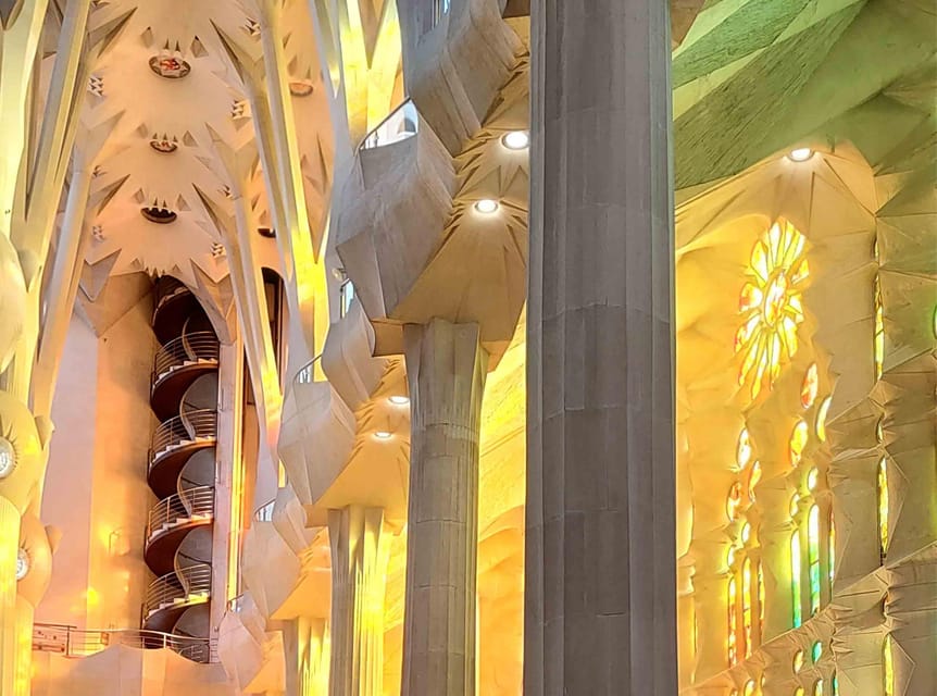 Sagrada Familia Guided Tour with Skip-the-Line Entry Ticket - Inside the basilica: light, sound, and the ALFA & OMEGA theme