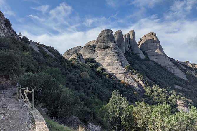 Semi-Private Montserrat Monastery, Funicular & Scenic Nature Walk - Farmers market stop: cheeses, snacks you can actually choose, and souvenirs