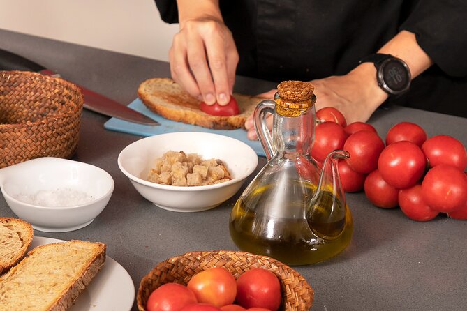 Spanish Tapas Workshop: Boqueria Tour & Rambla Views - Four-course dinner + unlimited Spanish wine with Ramblas views