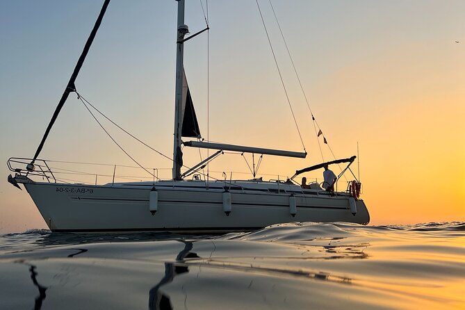 Sunset Sailing Cruise in Barcelona led by Young & Local Captain - Stop 2: Barceloneta coastline cruise for skyline and sea-breeze views