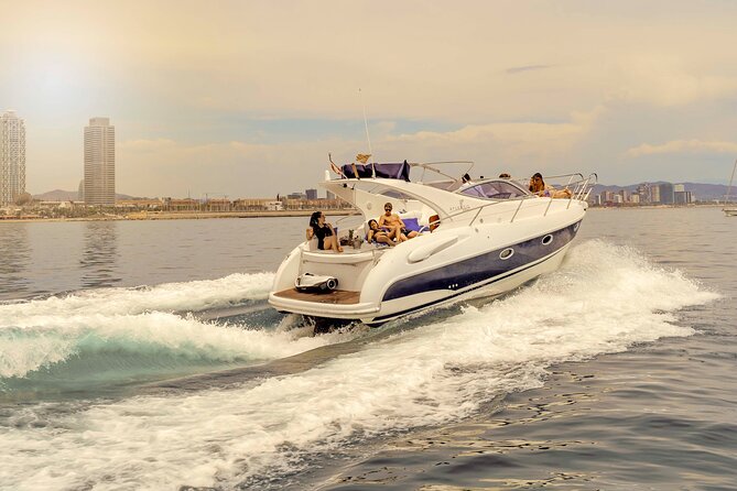 Sunset yacht ride in Barcelona + snacks and drinks - Cruising past Barceloneta beach from the water