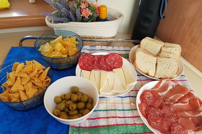 Sunset yacht ride in Barcelona + snacks and drinks - The skipper and the boat experience (why people come back)