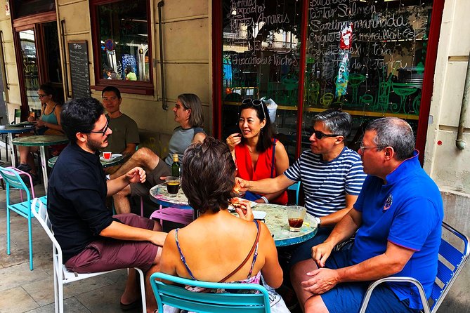 Tasty Barcelona Street Food Tour With Local Market Visit - Plaça de Sant Jaume: City Power, Generalitat, and a Pinchos Round